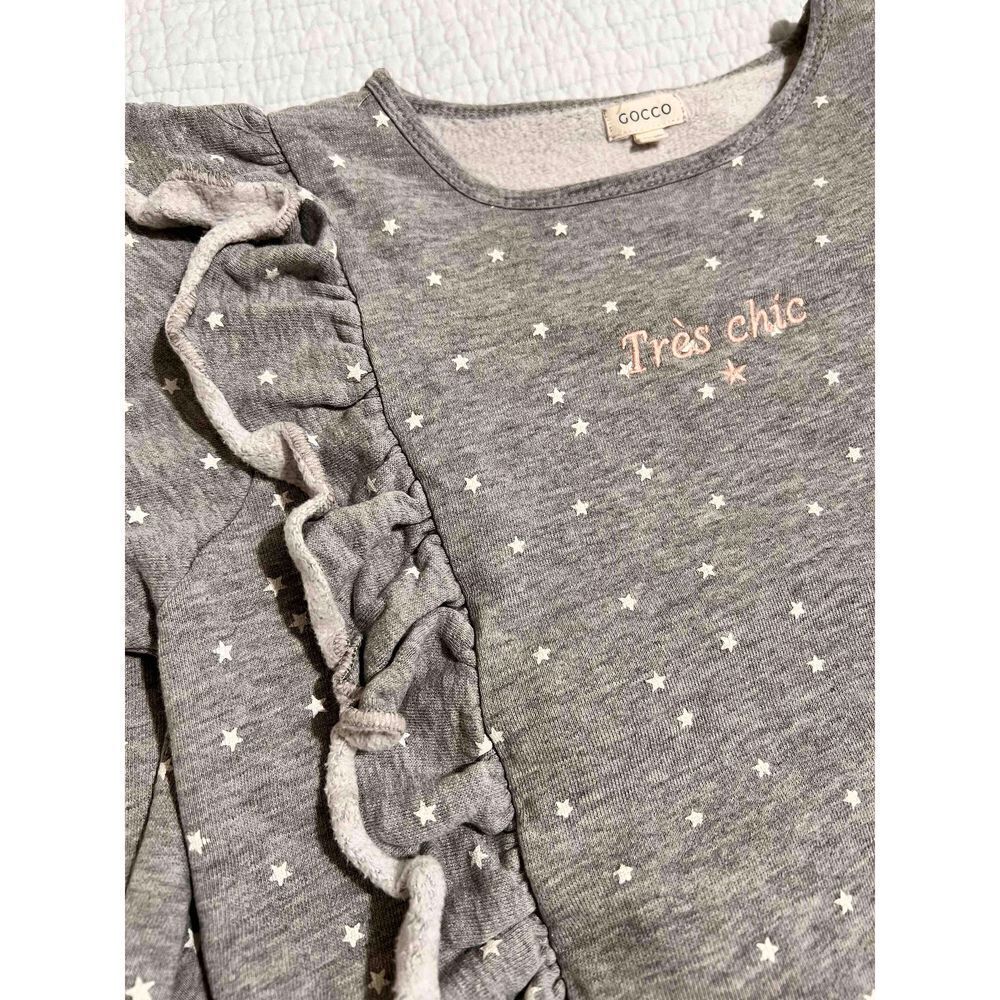 Coco Tres Chic Star Flutter Ruffle Top‎ - Picture 6 of 9